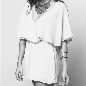 Akira ivory wrap cape romper size M